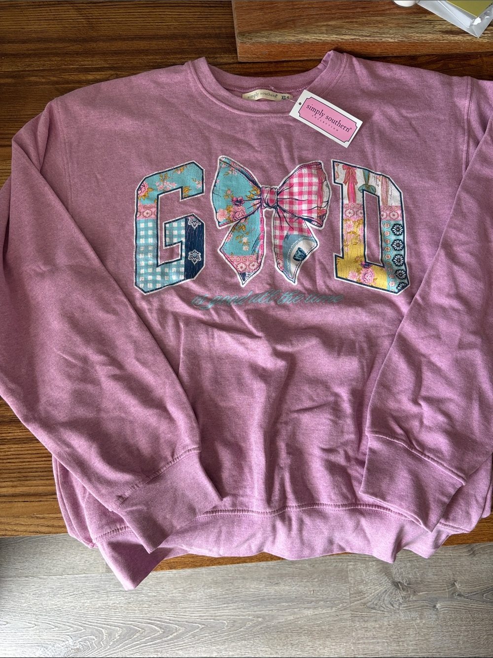 Simply Southern Pink Women’s Graphic Sweatshirt with Patchwork Bow